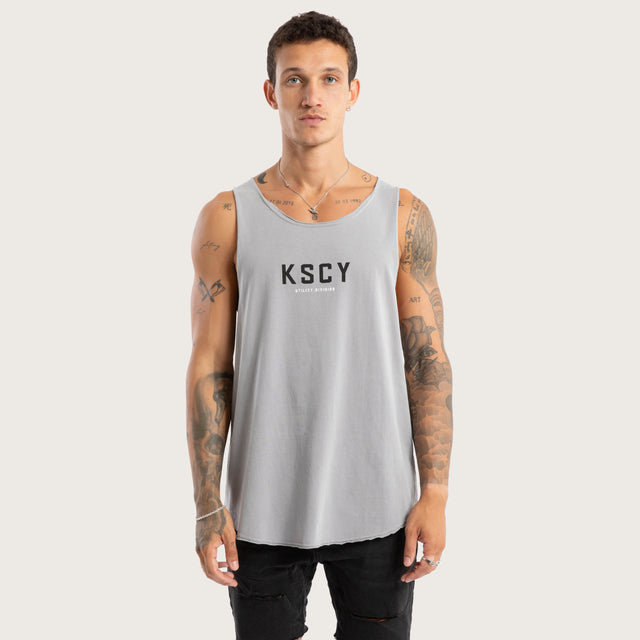 Model wears Visualise Raw Tank Pigment Silver Sconce Grey Tanks in Grey - Image 1