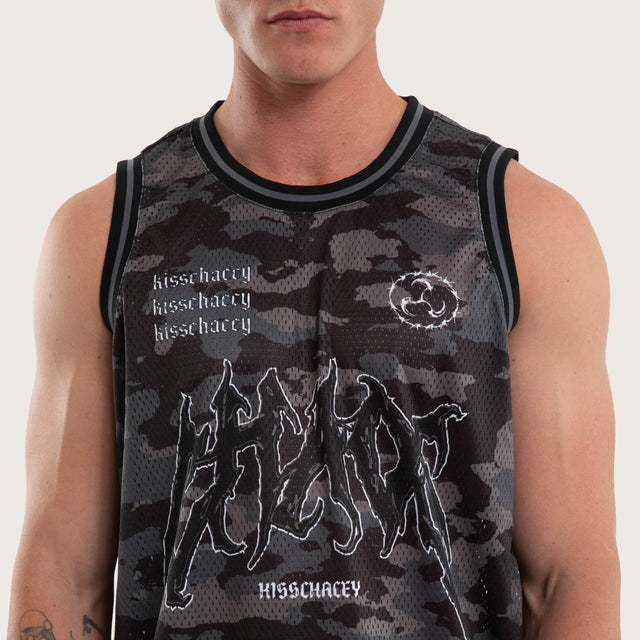 Model wears Glory Basketball Jersey Black Camo Jerseys in Camo - Image 2