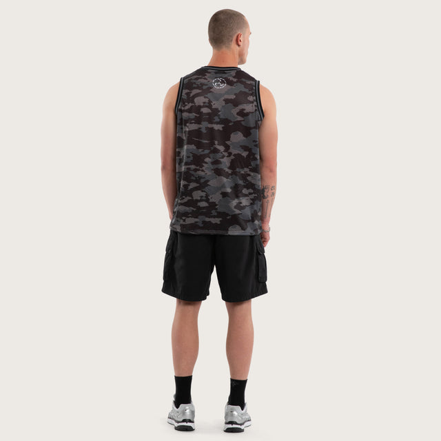 Model wears Glory Basketball Jersey Black Camo Jerseys in Camo - Image 4