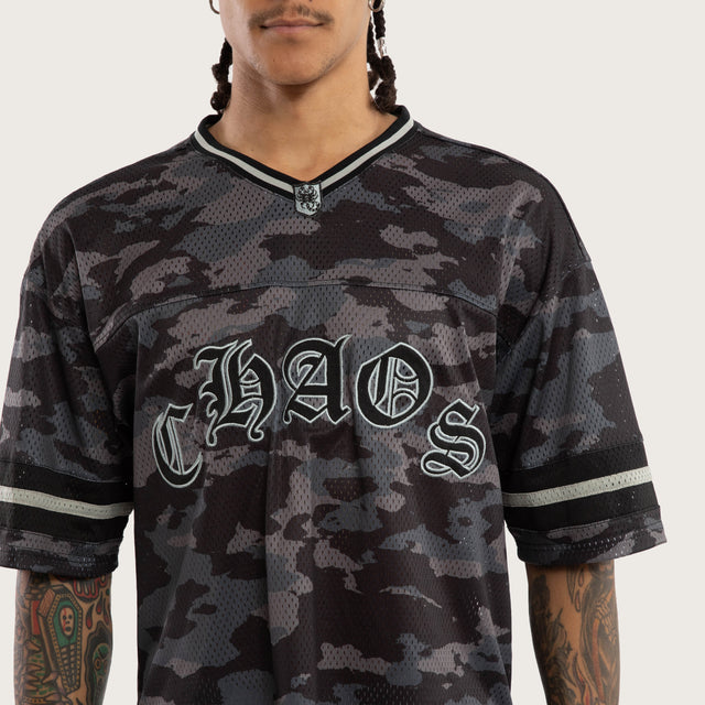 Model wears Pierced Football Jersey Black Camo Jerseys in Camo - Image 3