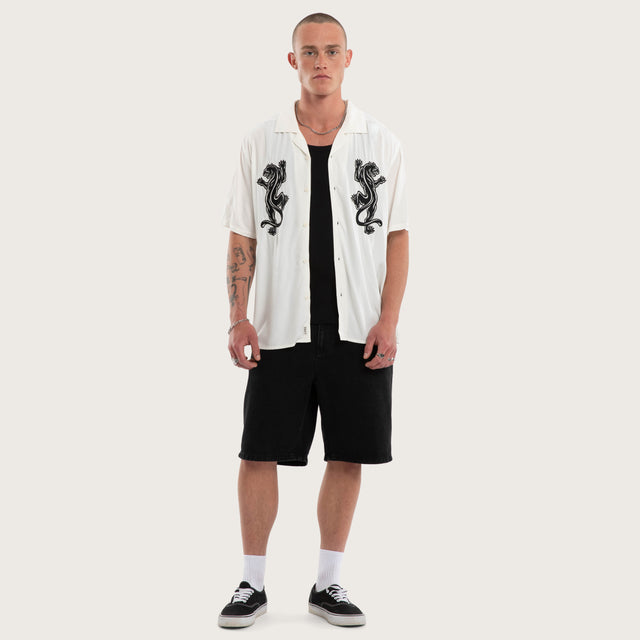 Model wears Risen Button Up Short Sleeve Shirt in Natural White Short Sleeve Shirts in White - Image 5