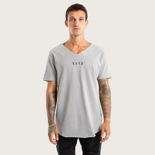 Model wears Made of Iron Raw Neck Tee Pigment Alloy T-Shirts Grey – image 1