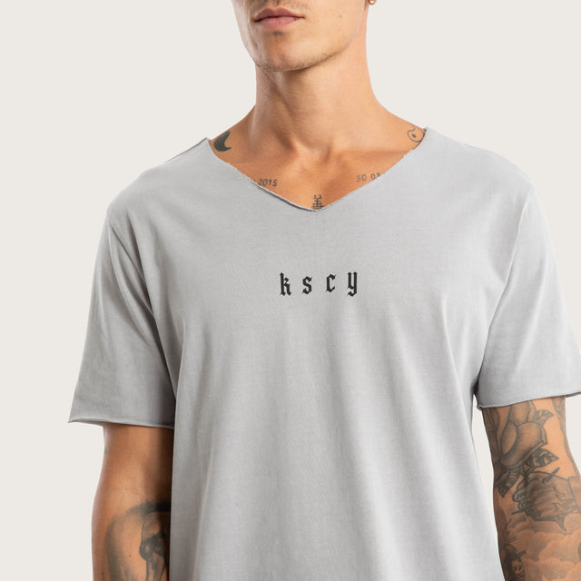 Model wears Made of Iron Raw Neck Tee Pigment Alloy T-Shirts Grey – image 3