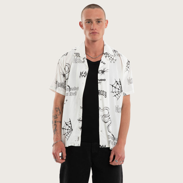 Model wears Coffin Relaxed Short Sleeve Shirt White Print Short Sleeve Shirts White – image 1