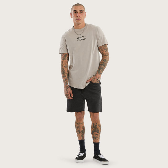 Model wears Sacred Dual Curved Tee Pigment Silver Cloud T-Shirts Grey – image 2