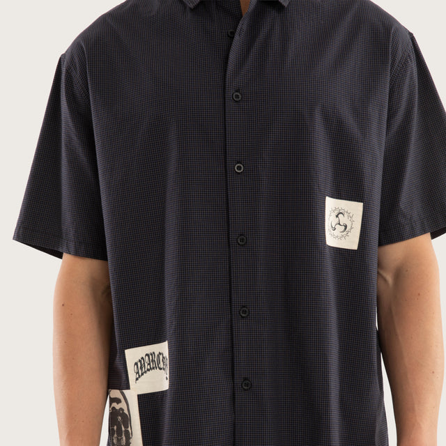 Model wears Ashfall SS Skate Shirt Asphalt Check Short Sleeve Shirts Grey – image 4