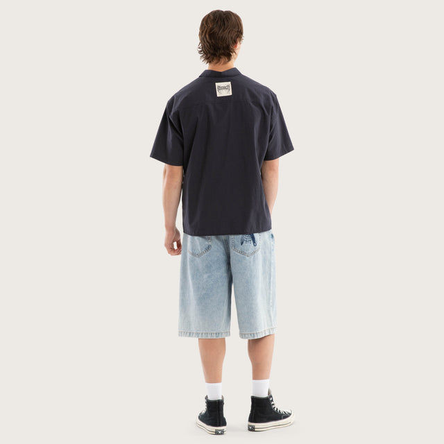 Model wears Ashfall SS Skate Shirt Asphalt Check Short Sleeve Shirts Grey – image 2