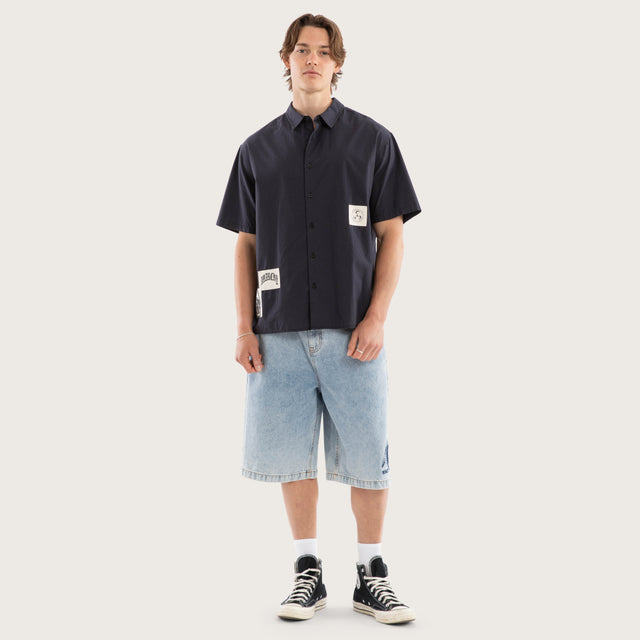 Model wears Ashfall SS Skate Shirt Asphalt Check Short Sleeve Shirts Grey – image 5