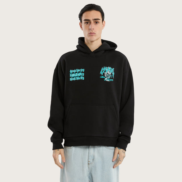 Model wears Agnus Oversized Hoodie Jet Black Hoodies in Black - Image 3