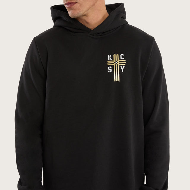 Model wears Guardian Curved Hem Hoodie Jet Black Hoodies in Black - Image 4