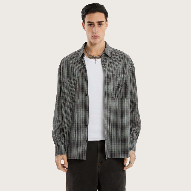 Model wears Devotion Casual Longsleeve Shirt Black Check Long Sleeve Shirts in Black - Image 1