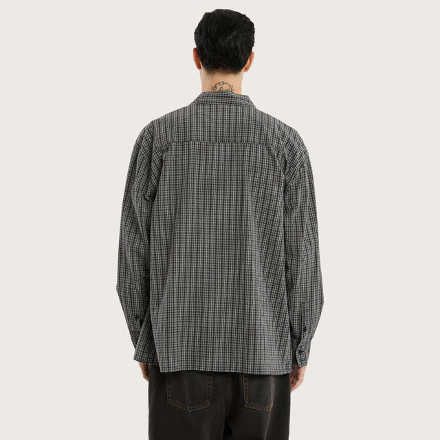 Model wears Devotion Casual Longsleeve Shirt Black Check Long Sleeve Shirts in Black - Image 2