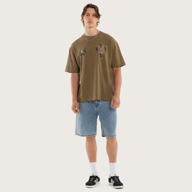 Model wears Anointed Box Fit Tee Military Green T-Shirts in Green - Image 2