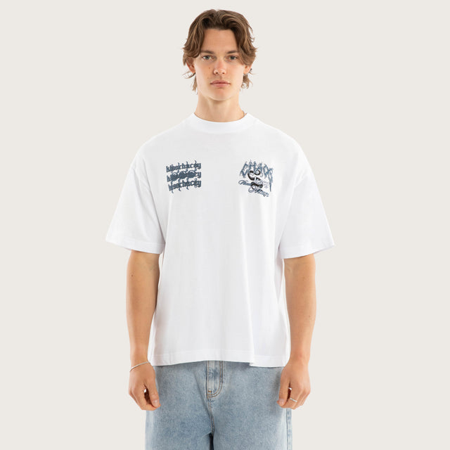 Model wears Clusters Street Tee Optical White T-Shirts in White - Image 4