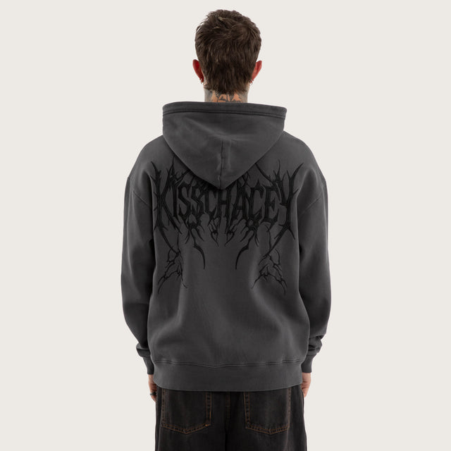 Model wears Renegade Relaxed Hoodie Pigment in Grey Hoodies in Grey - Image 4