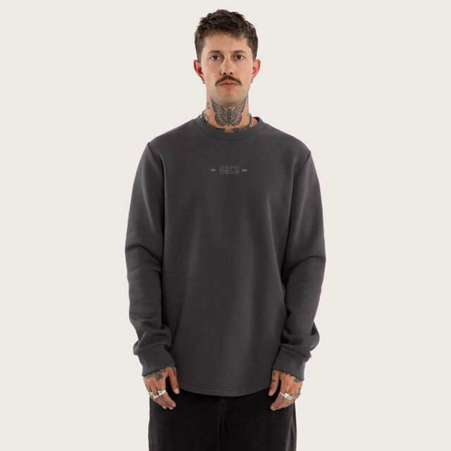 Model wears Insurgence Curved Hem Sweater Grey Jumpers in Grey - Image 3