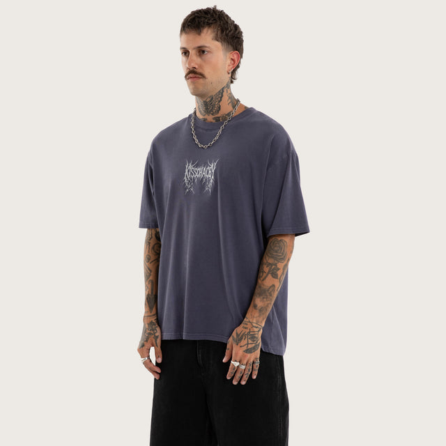 Model wears Revolt Box Fit Tee Snow Mystical T-Shirts in Purple - Image 3