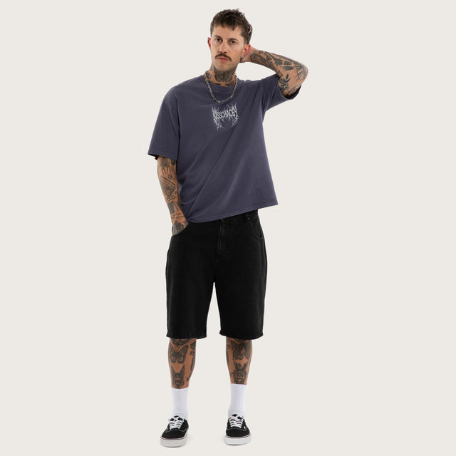 Model wears Revolt Box Fit Tee Snow Mystical T-Shirts in Purple - Image 5