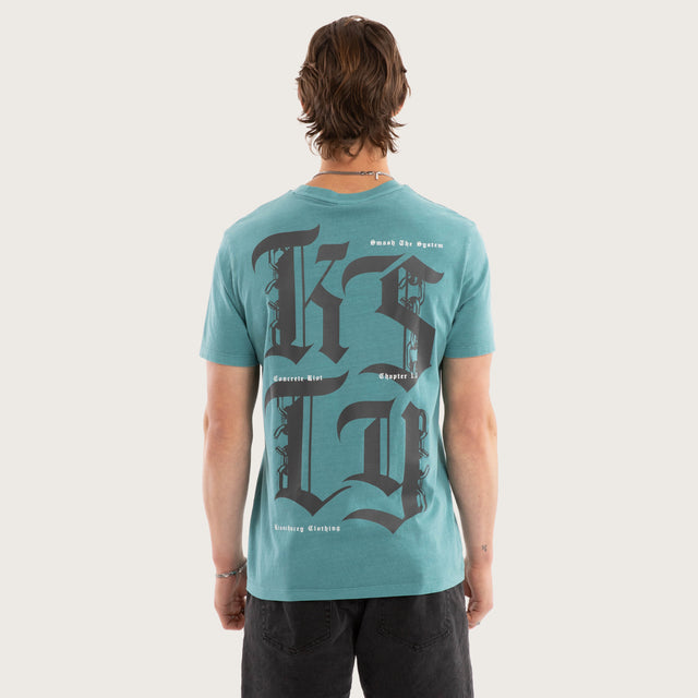 Model wears Mutiny Street Tee Pigment Brittany Blue T-Shirts in Blue - Image 1