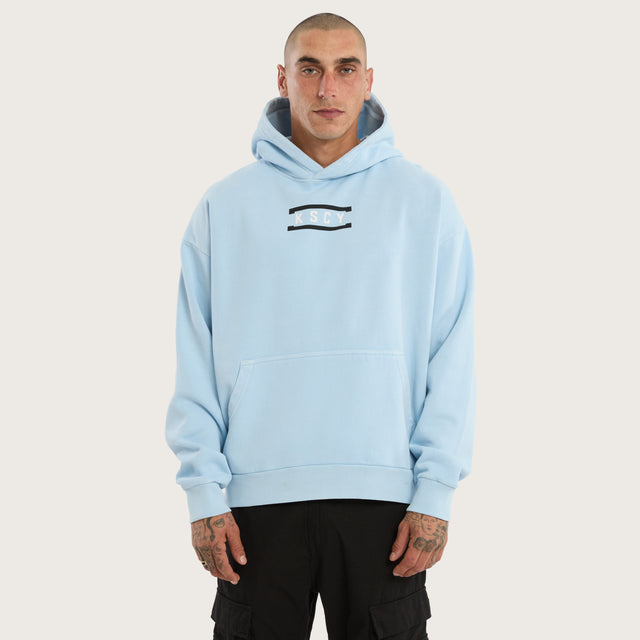 Model wears Constitute Oversized Hoodie Pigment Sky Blue Hoodies in Blue - Image 1