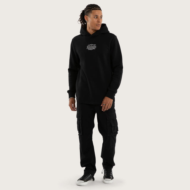 Model wears Risen Curved Hem Hoodie Jet Black Hoodies in Black - Image 6