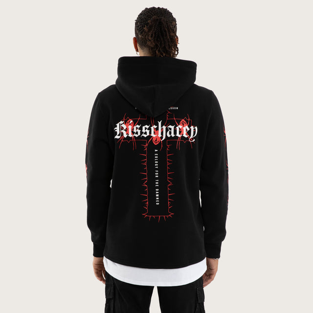 Model wears Rebuke Layered Hoodie Jet Black Hoodies in Black - Image 4