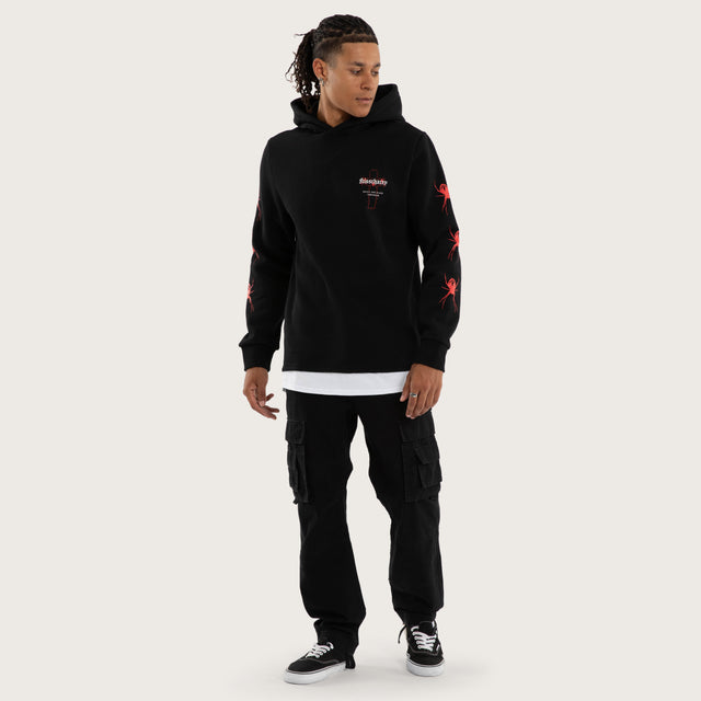 Model wears Rebuke Layered Hoodie Jet Black Hoodies in Black - Image 6