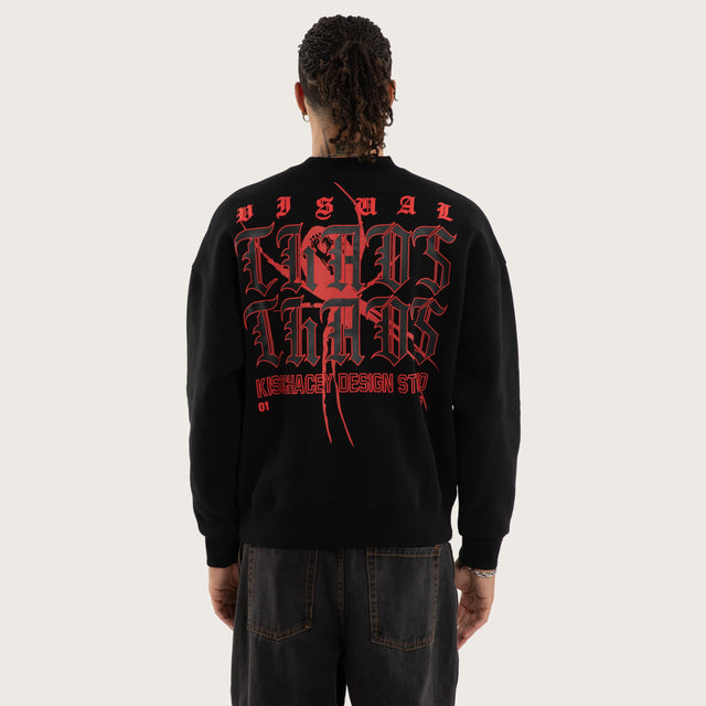 Model wears Protestant Box Fit Sweater Jet Black Jumpers in Black - Image 4