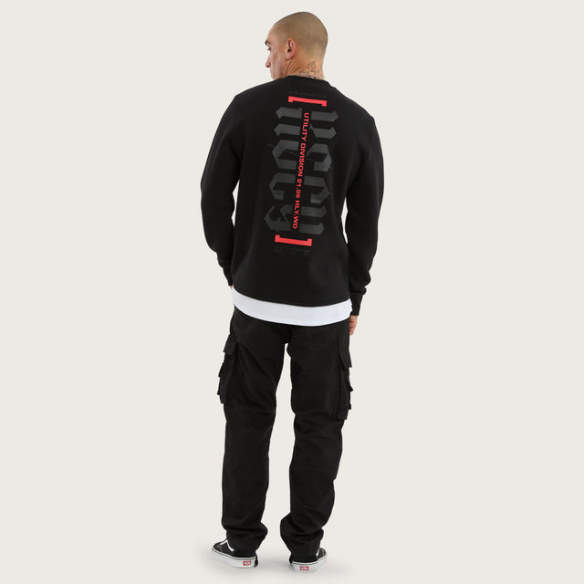 Model wears Apparition Layered Sweater Jet Black Jumpers in Black - Image 5