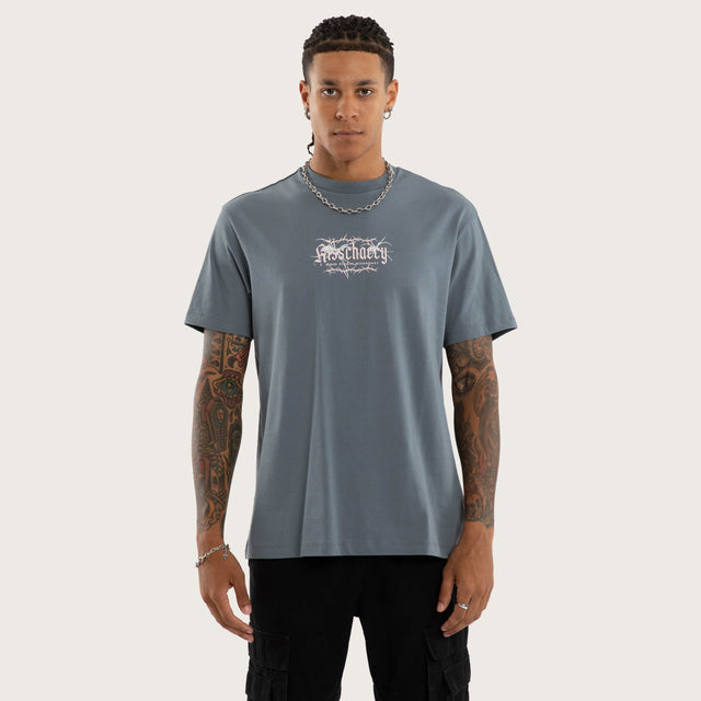 Model wears Charlotte Relaxed Tee in Blue T-Shirts in Blue - Image 1