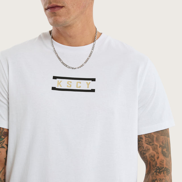 Model wears Rain Curved Hem Tee Optical White T-Shirts in White - Image 4