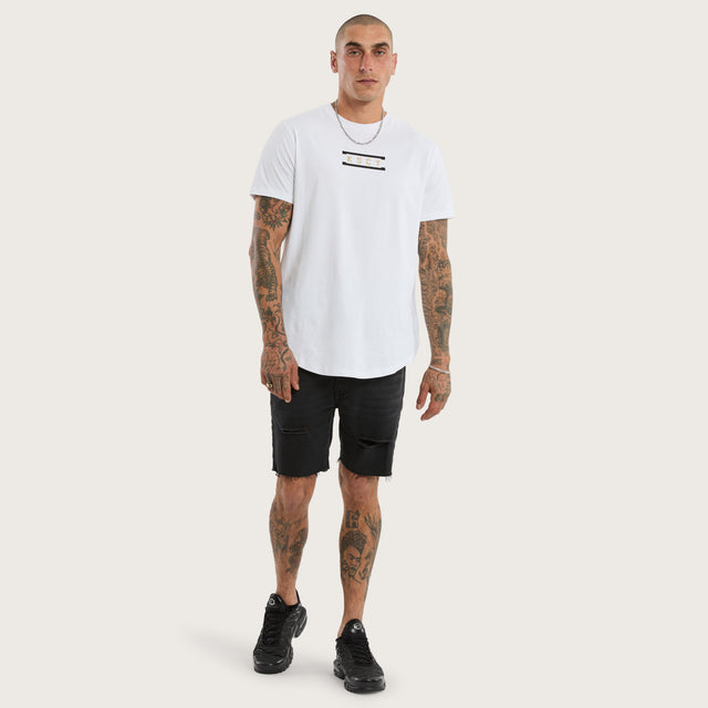Model wears Rain Curved Hem Tee Optical White T-Shirts in White - Image 2