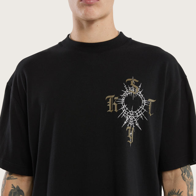 Model wears Depiction Street Tee Jet Black T-Shirts in Black - Image 4