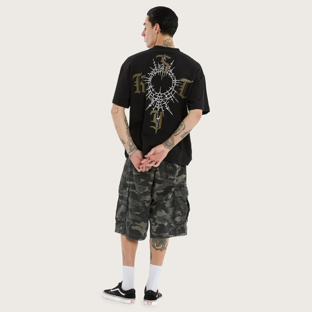 Model wears Depiction Street Tee Jet Black T-Shirts in Black - Image 5