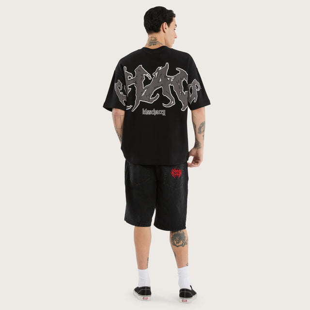 Model wears Melt Cotton Loopback Box Fit Tee in Black T-Shirts in Black - Image 4