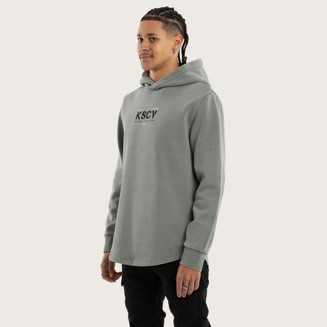 Model wears Reverence Dual Curved Hoodie Pigment Neutral Grey Hoodies Grey – image 4