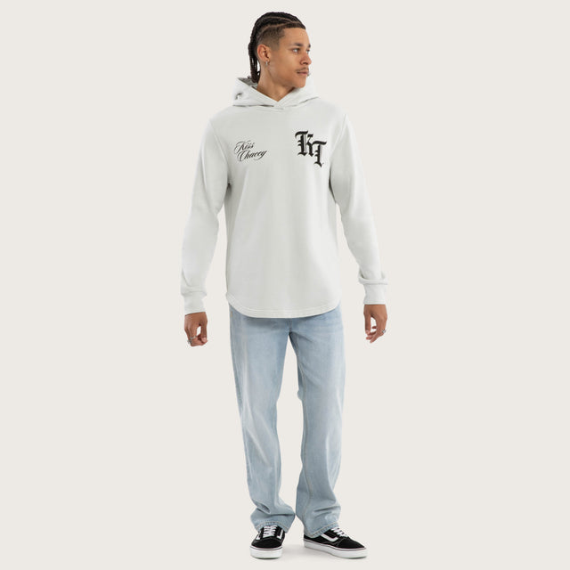 Model wears Fracture Dual Curved Hoodie Pigment Glacier Grey Hoodies Grey – image 2