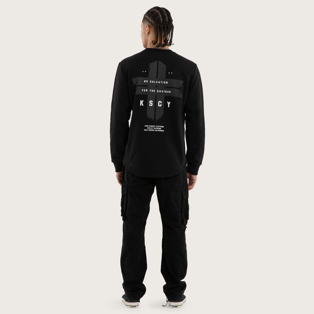 Model wears Salvation Dual Curved Sweater Jet Black Jumpers Black – image 5