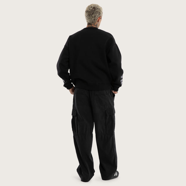 Model wears Titanium Box Fit Sweater Jet Black Jumpers Black – image 2