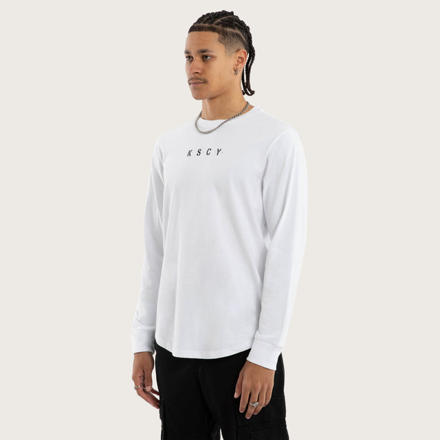 Model wears Sledge Cape Back LS Tee Optical White Longsleeve T-Shirts White – image 4