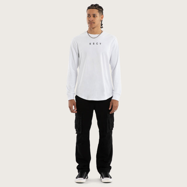 Model wears Sledge Cape Back LS Tee Optical White Longsleeve T-Shirts White – image 2