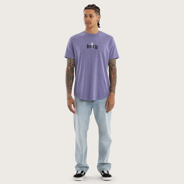Model wears Virtue Dual Curved Tee Pigment Daybreak T-Shirts Purple – image 5