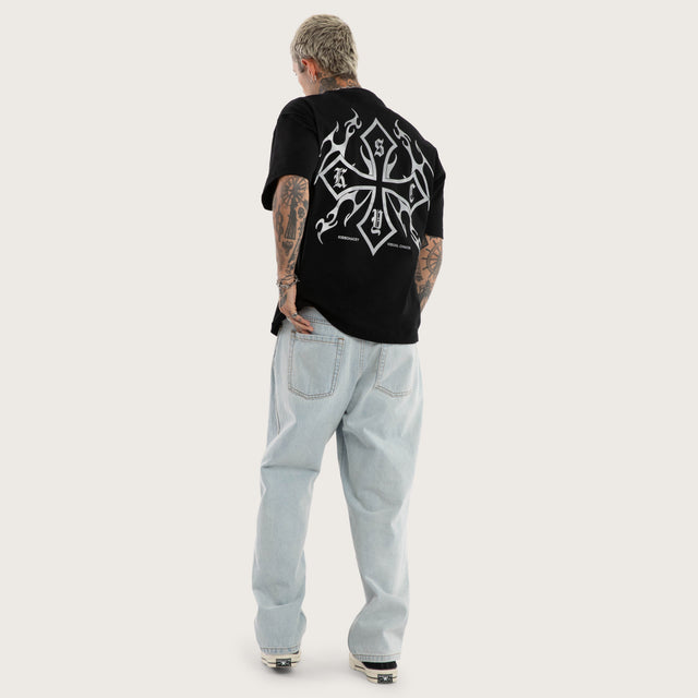 Model wears Barbed Street Tee Jet Black T-Shirts Black – image 5
