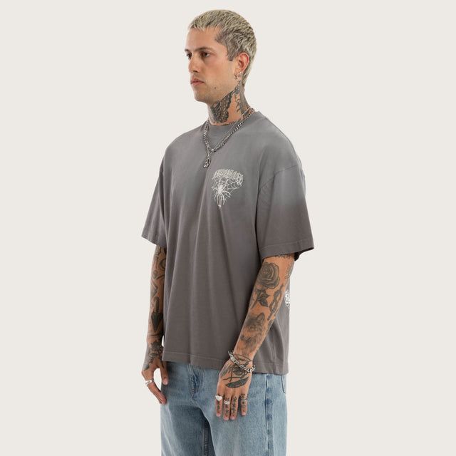 Model wears Knuckle Street Tee Sunbleach Charcoal T-Shirts Grey – image 4
