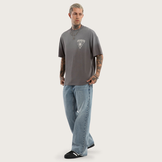 Model wears Knuckle Street Tee Sunbleach Charcoal T-Shirts Grey – image 2