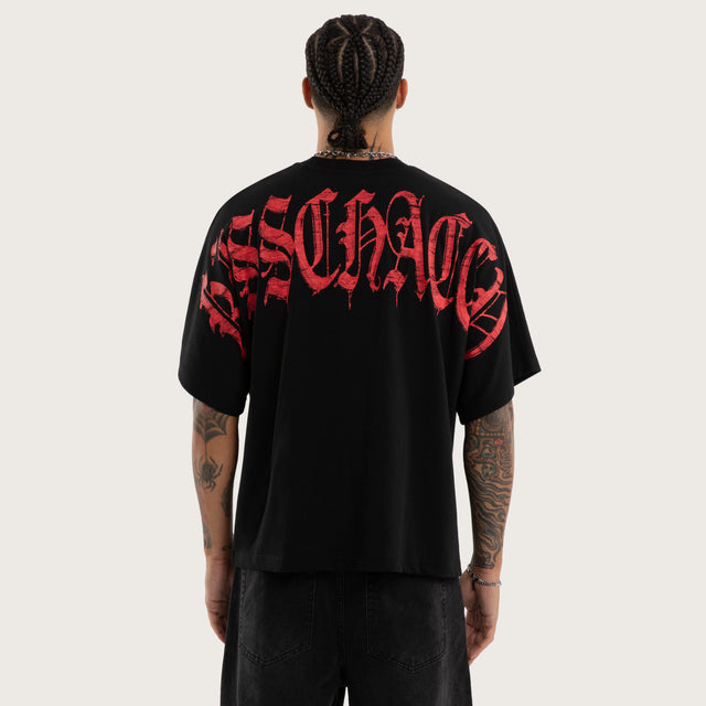 Model wears Overdrive Batwing Tee Jet Black T-Shirts in Black - Image 1