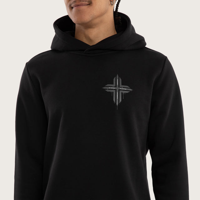 Model wears Worship Curved Hem Hoodie Jet Black Hoodies in Black - Image 4