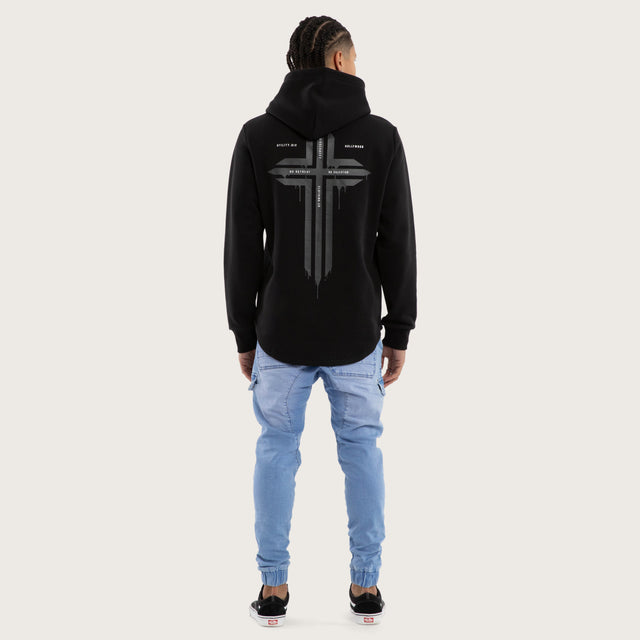 Model wears Worship Curved Hem Hoodie Jet Black Hoodies in Black - Image 5
