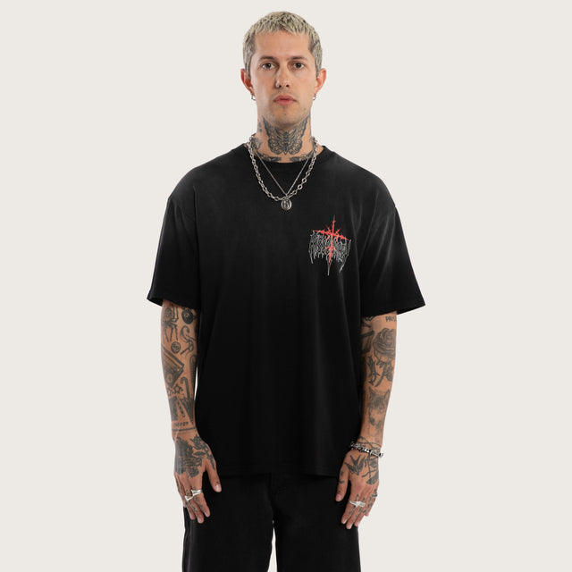 Model wears Embers Box Fit Tee Sunbleach Black T-Shirts in Black - Image 1