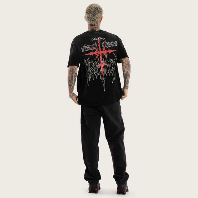 Model wears Embers Box Fit Tee Sunbleach Black T-Shirts in Black - Image 4